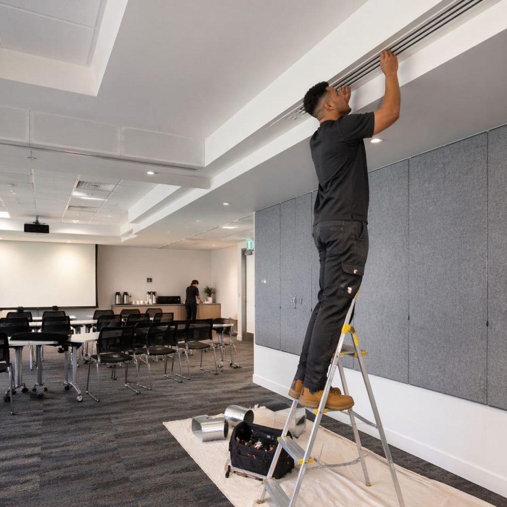 Office Air Conditioning Bulkhead Grille Installation in Training Suite - Illustrative Image