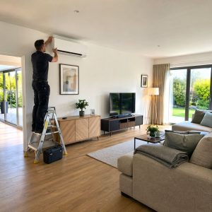 Wall-Mounted Air Conditioning Unit Installation in Modern Living Room - Illustrative Image
