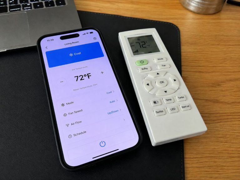 an illustrative image of close-up showing the controls on a smart air conditioning remote and a connected app on a smartphone